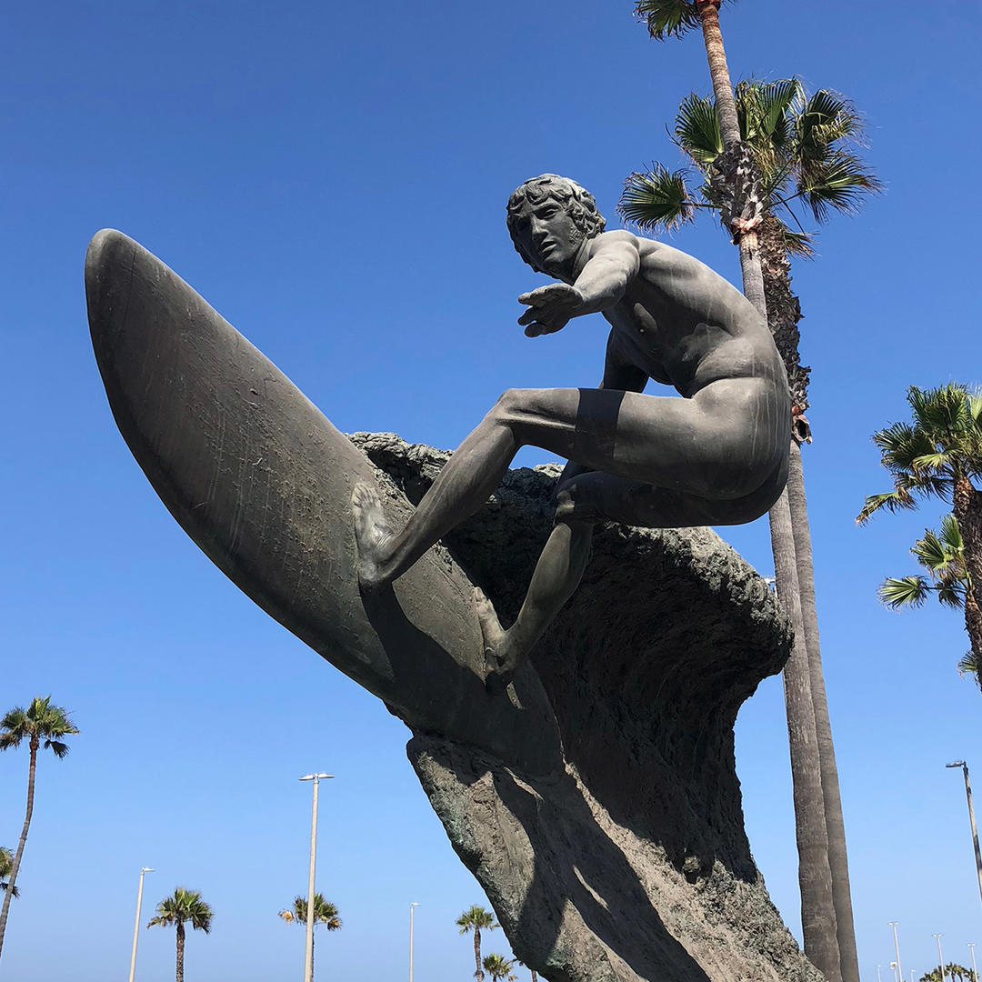 Naked Surfer Statue